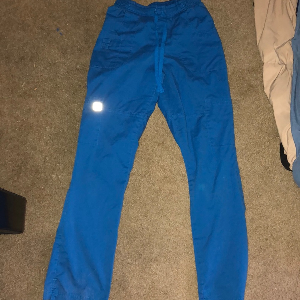 Small royal blue scrub pants.